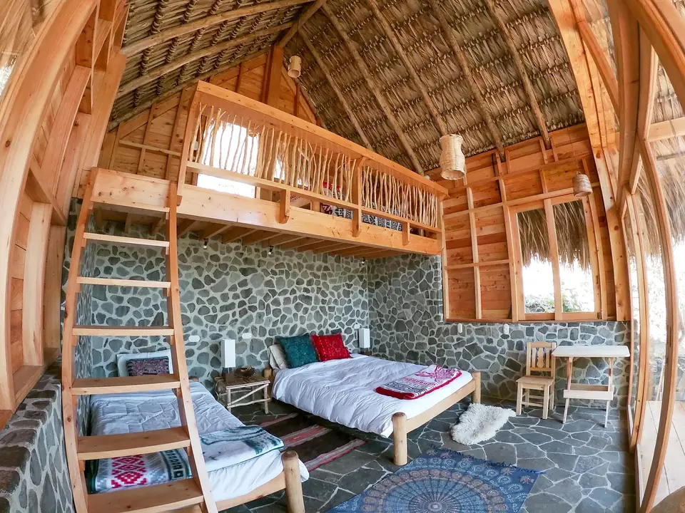Inti: ground floor beds and loft, wide angle
