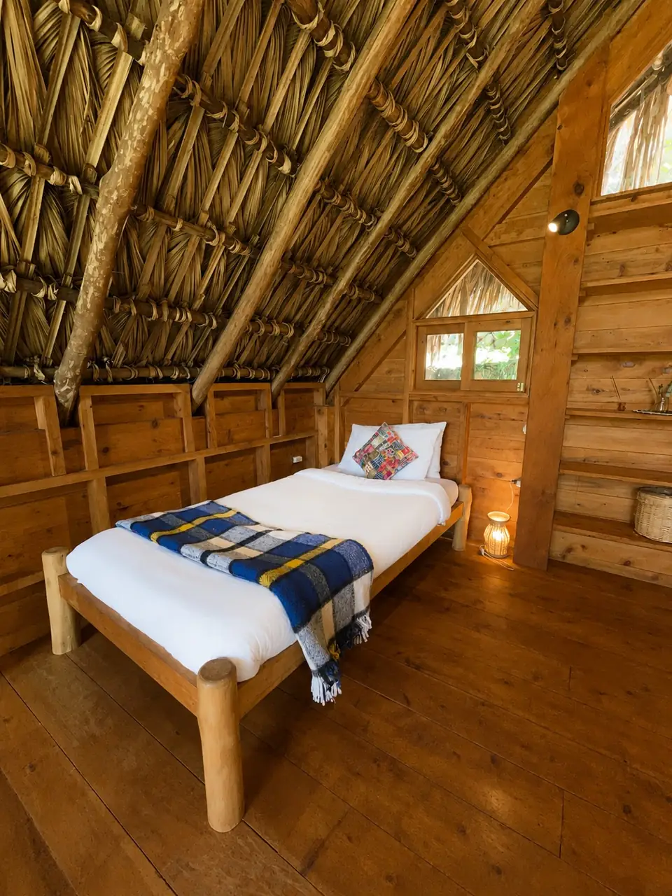 Kiya: loft single bed, thatched roof.