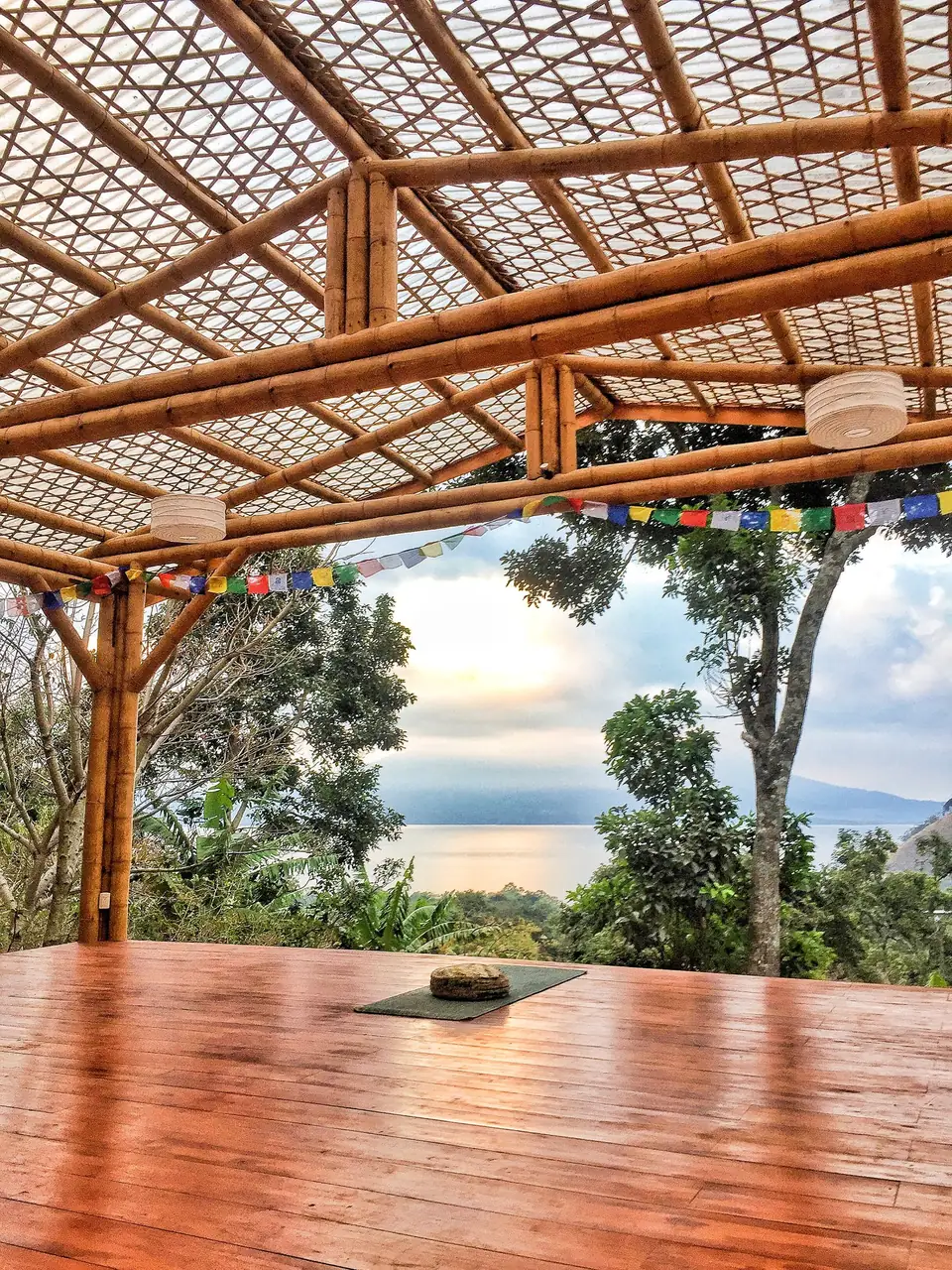 The open-air shala deck looking out over the lake